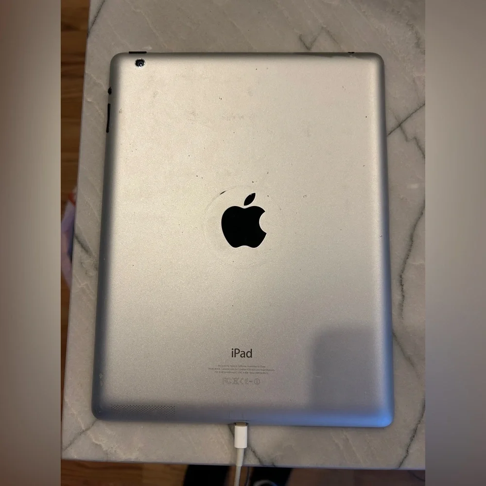 Apple iPad 10.3.3 with White Frame and silver casing 9.5” X 7.25”- used
